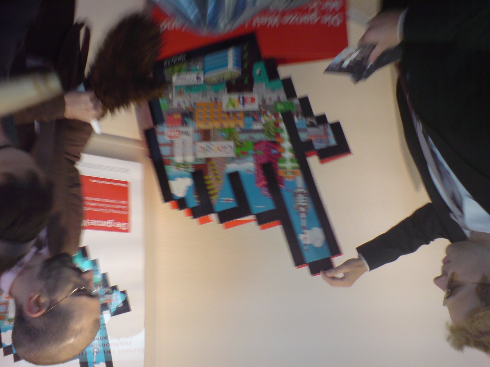Second Life shown on a mobile screen on the street