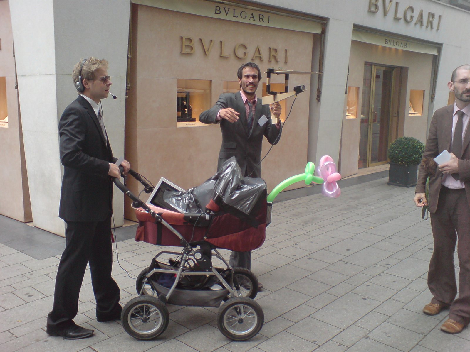 The mobile team with the equipment-pram in front of Bulgari
